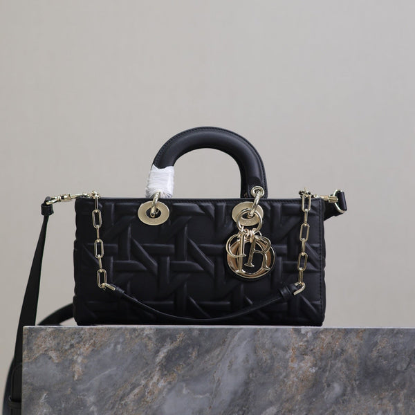 LADY D-JOY BAG 26 IN BLACK GRAPHIC CANNAGE CALFSKIN PALE GOLD-FINISH METAL CHARMS