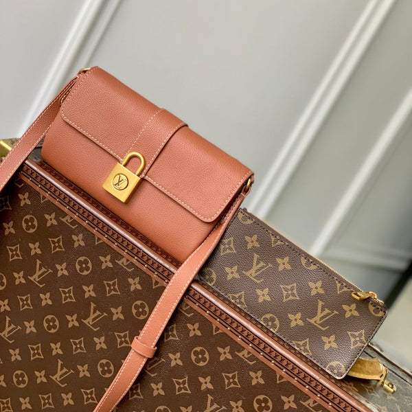 LOW KEY BAG 22 IN COGNAC BROWN CALFSKIN