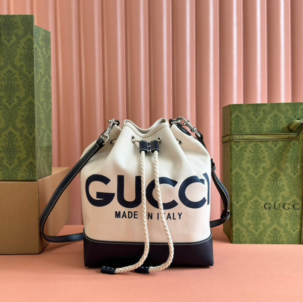 DRAWSTRING SHOULDER BAG LOGO PRINT 31 IN WHITE CANVAS DARK BLUE CALFSKIN